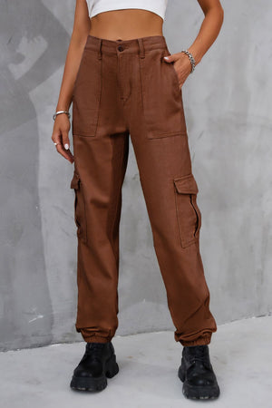 Brown utility cargo trousers with elasticated cuffs and multiple pockets.