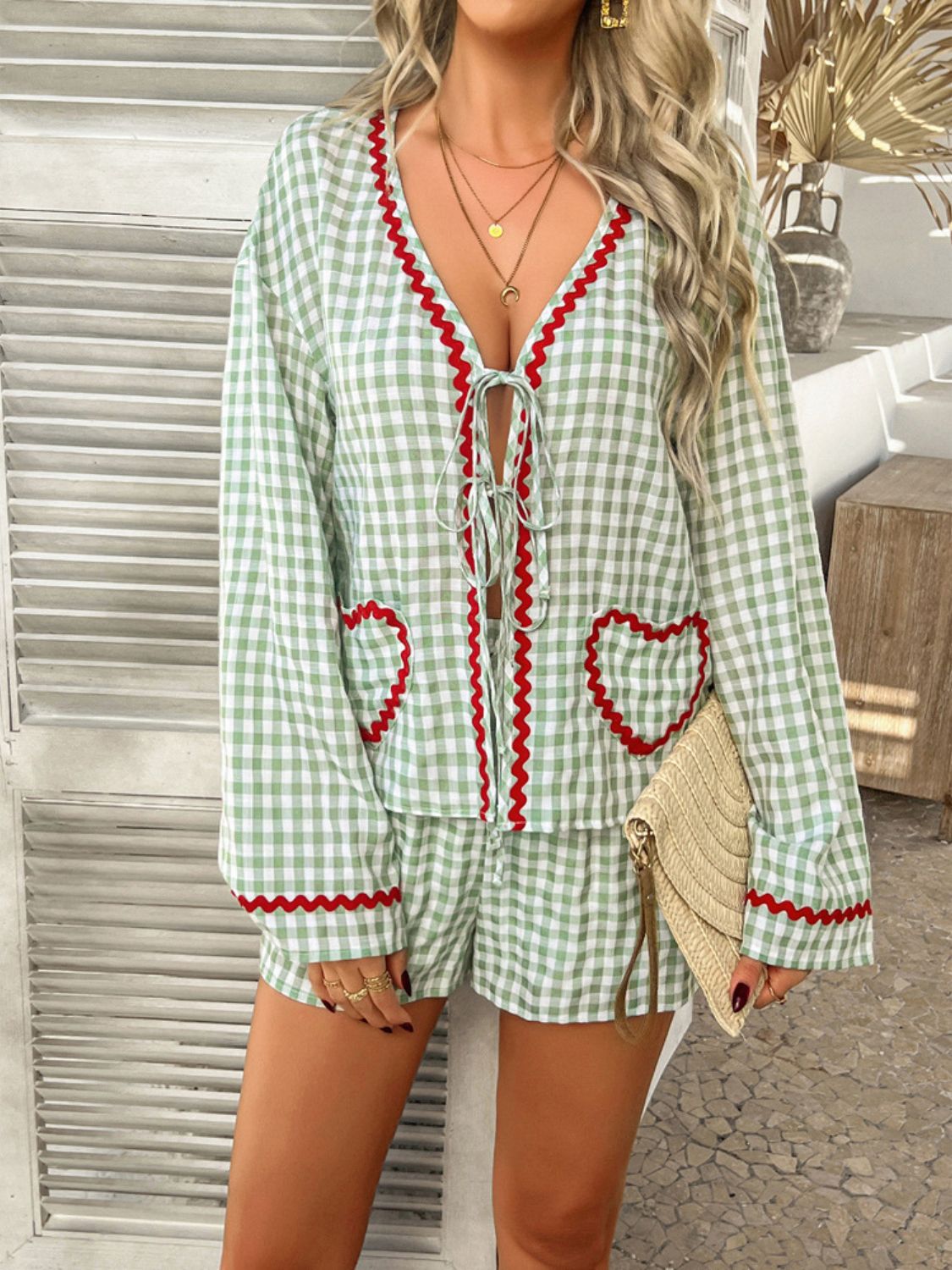 Light green gingham lounge set with heart pockets and red trim, tie-front top and shorts.