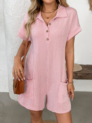 Blush pink ribbed knit romper with white pinstripes, patch pockets, and button detail.