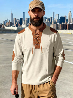 Men's apricot long-sleeve t-shirt with lace-up neckline and contrast elbow patches.