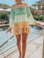 Open-knit beach cover-up with fringe hem in pastel stripes and peach.