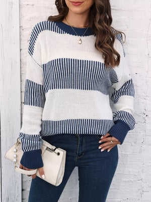 Cozy knit sweater with color block stripes in white and dark blue, crew neck, long sleeves.