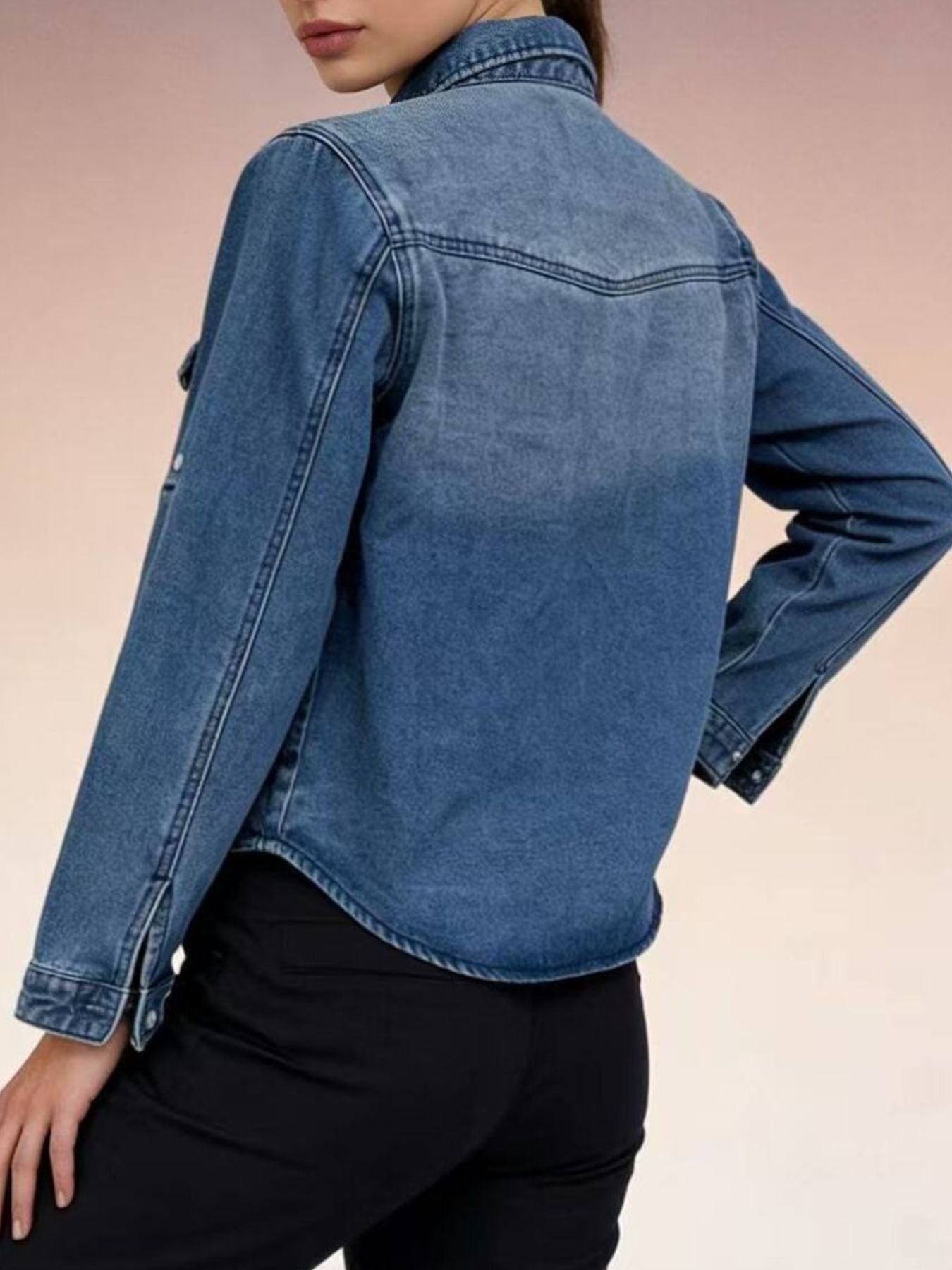 Classic blue denim overshirt with button-down front and western yoke detail.