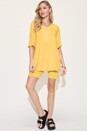 Yellow bamboo loungewear set with relaxed fit tee and bike shorts.