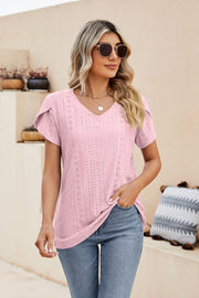 Blush pink knit top with v-neck and perforated sleeve details
