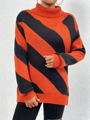Orange-red and black diagonal stripe turtleneck knit sweater with ribbed cuffs and hem.