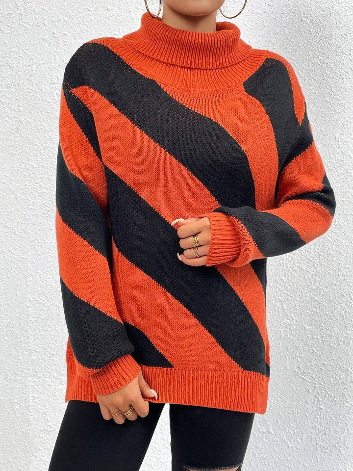 Orange-red and black diagonal stripe turtleneck knit sweater with ribbed cuffs and hem.
