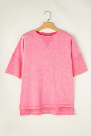 Pink acid wash tee with layered sleeves and V-stitch neckline detail.
