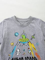 Grey cotton toddler t-shirt with a fun space graphic featuring a dinosaur in a UFO, astronaut, and rockets.