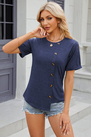 Dark blue asymmetric button-up tee with short sleeves and a rounded neckline.