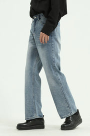 Light blue denim jeans with a wide-leg cut and a casual, relaxed fit.