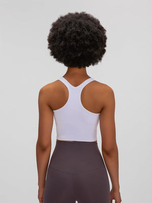 White sculpted racerback crop tank top with a V-neck detail.