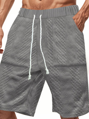 Men's grey quilted texture drawstring chino shorts with diamond pattern.