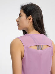 Pink Purple mesh-back performance tank top with cutout detail and racerback sports bra visible.