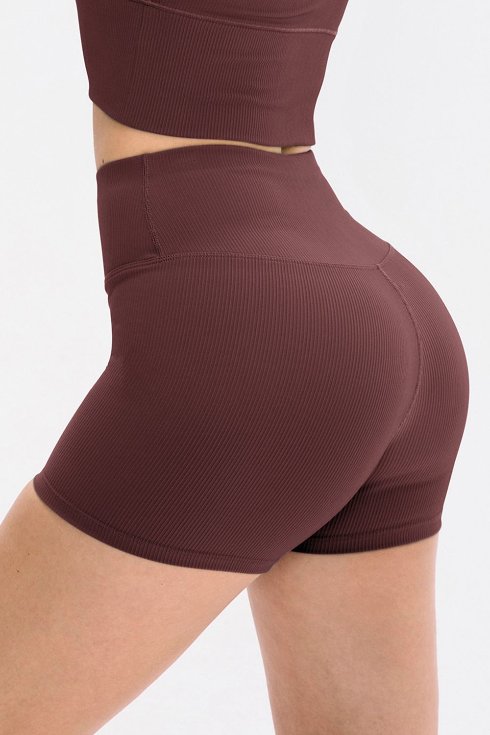 Burgundy ribbed sculpting active shorts with high waist and v-cut detail