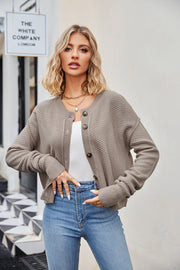Textured knit cropped cardigan in mocha with button front and crew neck.