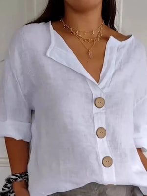 White linen blend button-down shirt with relaxed fit and wooden buttons.
