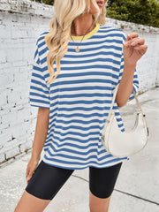 Blue and white striped relaxed tee with yellow contrast neck and short sleeves.