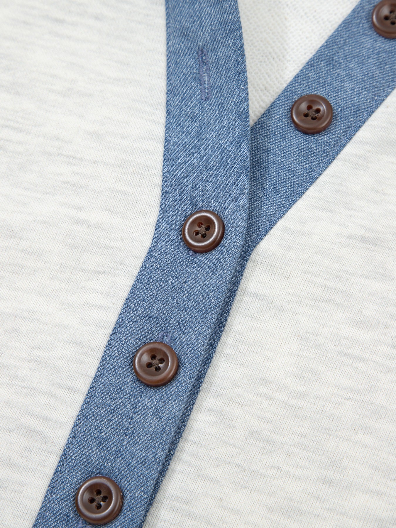 Heathered casual top with button detail and denim trim