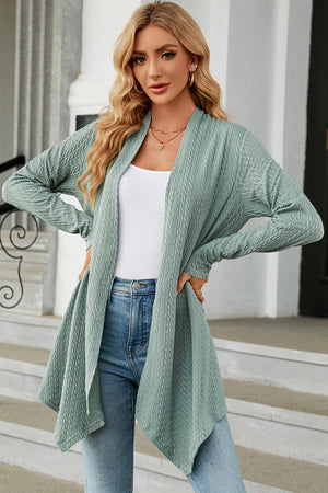 Light green textured knit cardigan with asymmetrical drape front and long sleeves.