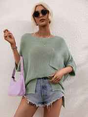 Sage relaxed knit tunic top with boat neck and front pocket, styled with denim shorts.