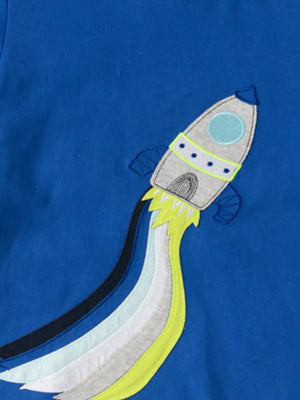 Blue toddler t-shirt with a gray rocket applique and colorful exhaust flames.