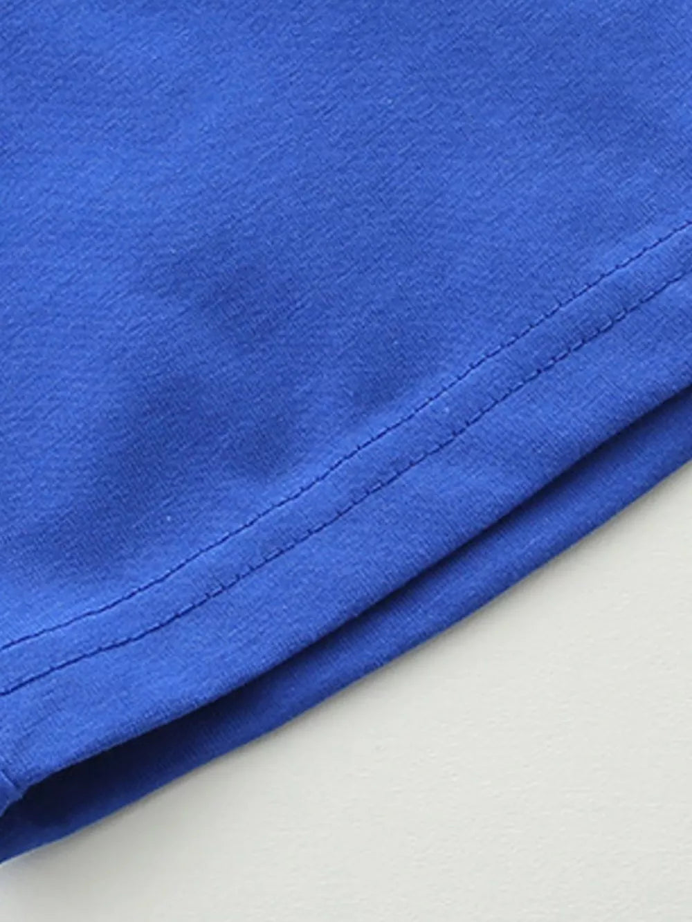 Boys' blue cotton underwear set detail showing stitching