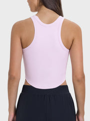 Blush pink ribbed racerback active tank top with curved hem