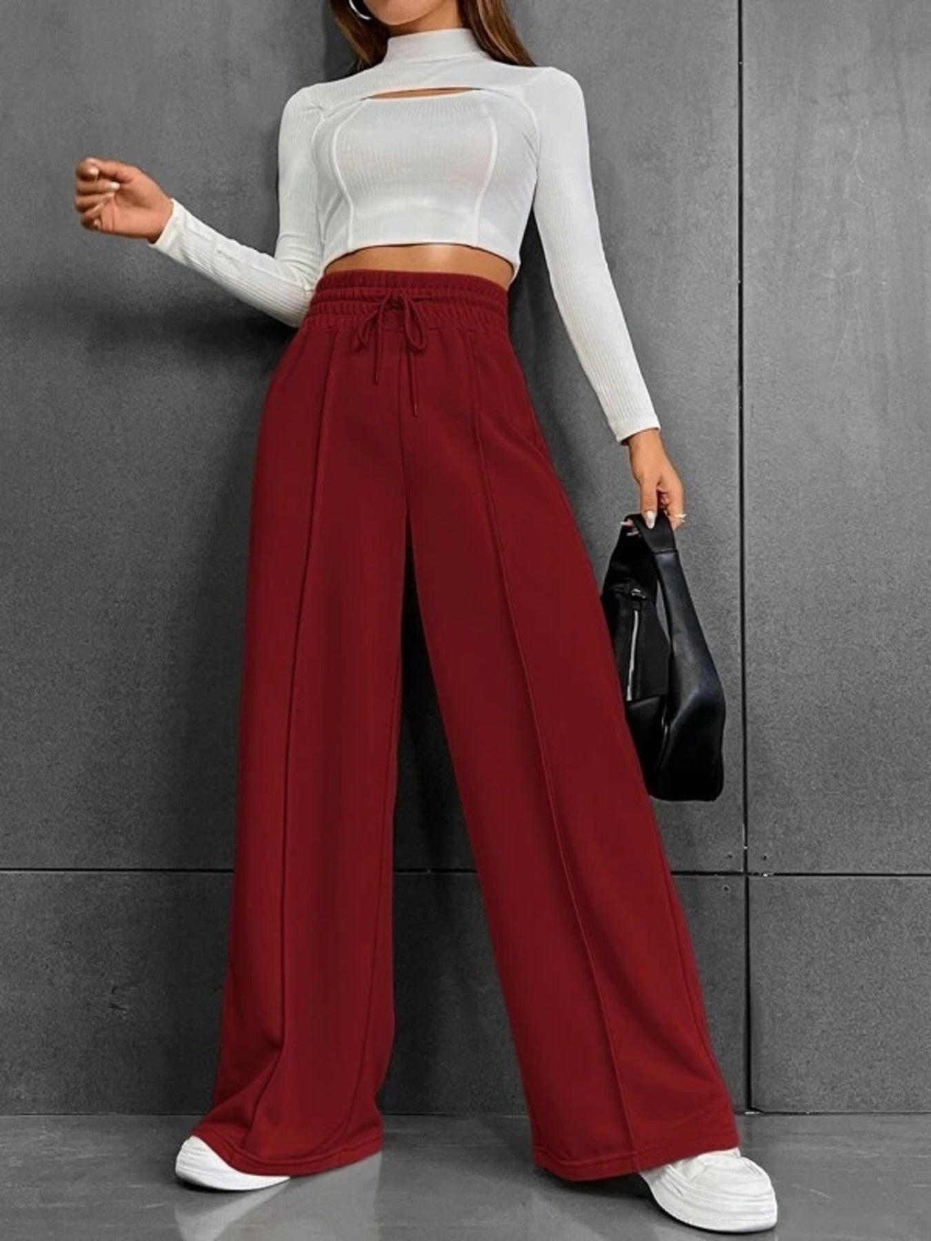 Wine red wide-leg sweatpants with drawstring waist and front seam detail