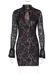 Black lace cutout mini dress with flared sleeves and mock neck.