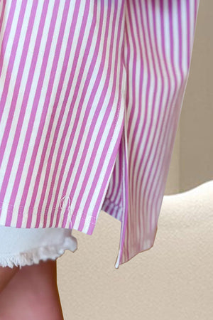 Pink and white striped 3/4 sleeve tee with side slits and a cotton blend.