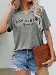 Mid Gray t-shirt with God Bless America script graphic and short sleeves.