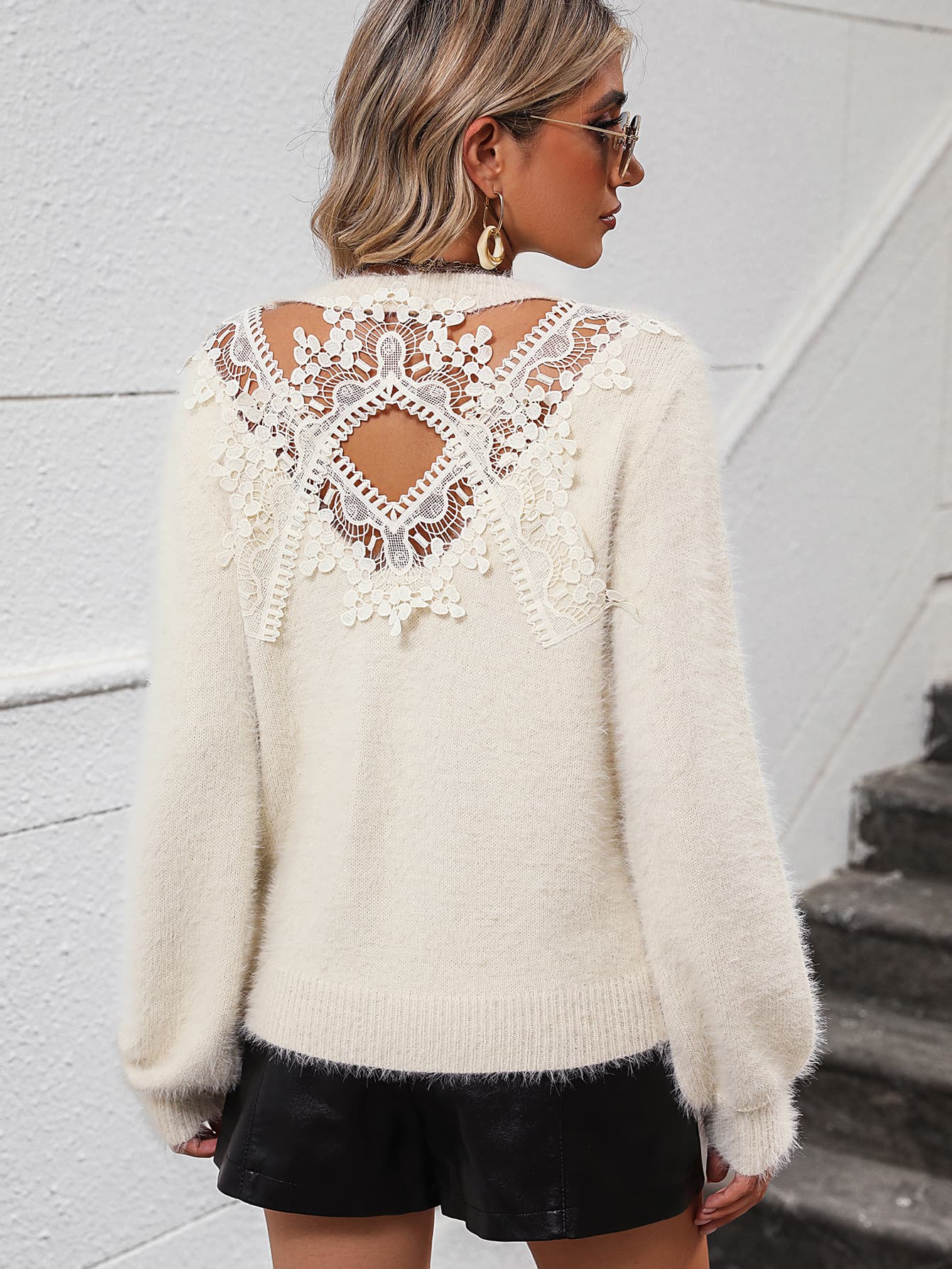 Ivory fluffy knit sweater with intricate white lace back detail and diamond cutout.