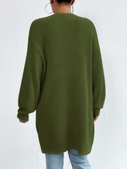 Longline knit open cardigan in green acrylic with ribbed texture and long sleeves.