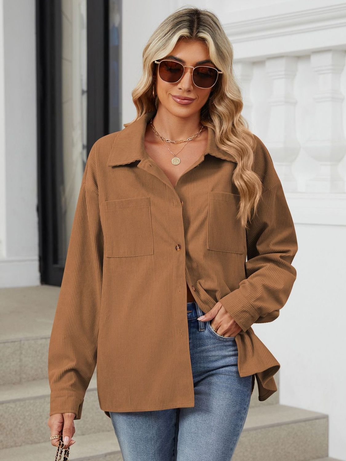 Caramel corduroy overshirt with patch pockets and button front, styled with jeans.