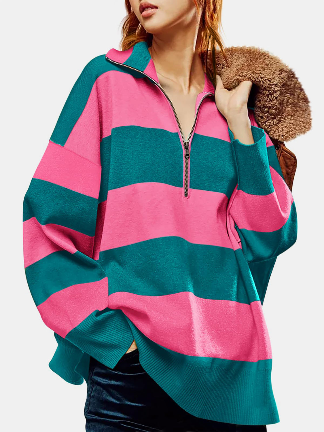 Oversized zip-up pullover with bold pink and teal stripes, acrylic knit, quarter zip neckline.