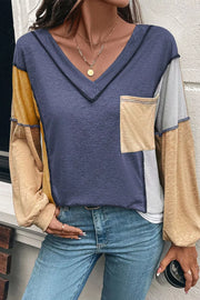 Contrast stitch v-neck t-shirt in dusty blue with colorblock sleeves and chest pocket.