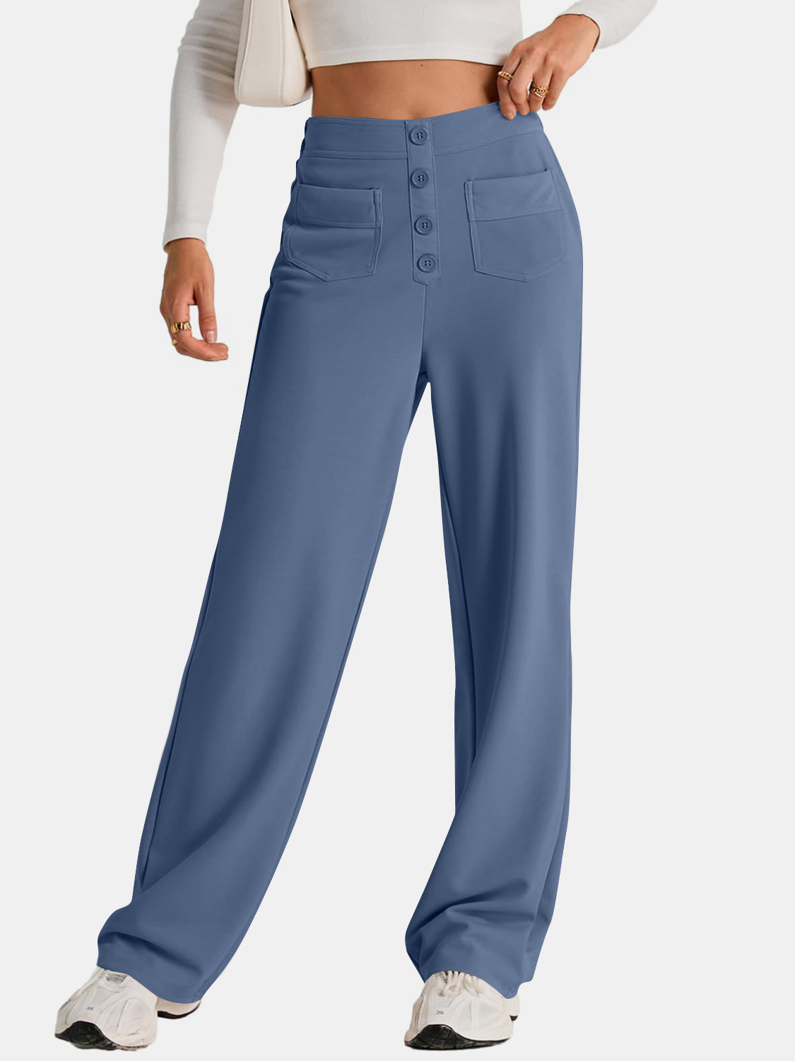 Button-front wide leg trousers in Dusty Blue with flap pockets.