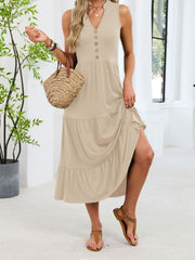 Apricot tiered midi dress with notched V-neck and decorative buttons, sleeveless.