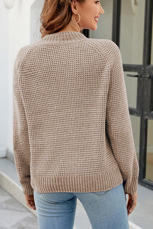 Waffle knit raglan sleeve pullover sweater in Khaki with ribbed cuffs and hem.
