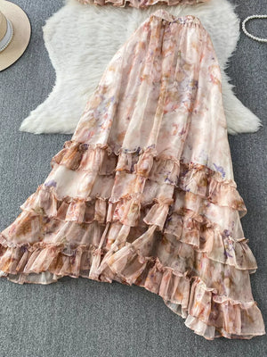 Floral ruffle set with bow detail in pink and light green, featuring a tiered skirt.