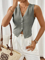 Chic striped knit V-neck tank top with button front, styled with white pants.