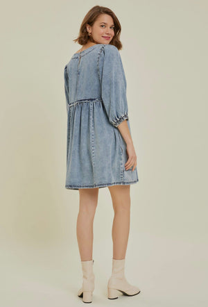 Gathered waist denim mini dress in medium wash with balloon sleeves and square neckline.