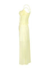 Apricot cami set with smocked bodice and tied front, paired with a flowy maxi skirt.