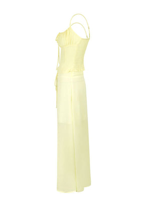 Apricot cami set with smocked bodice and tied front, paired with a flowy maxi skirt.