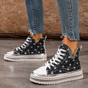 Black canvas high-top sneakers with rhinestone embellishments and a chunky sole.