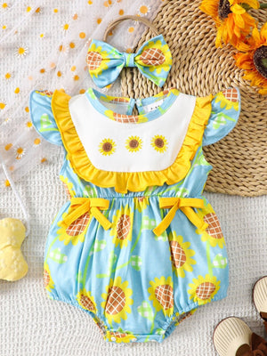 Baby girls' blue sunflower print cotton romper with yellow ruffles and bow detail.