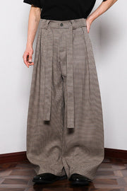 Men's belted wide leg plaid sweatpants in brown with a tie waist.
