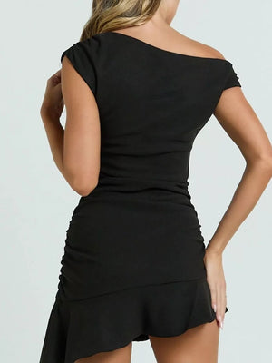 Black asymmetrical ruffle hem mini dress with ruched side detail.