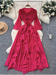 Rose Red brocade A-line midi dress with cascading ruffles and bell sleeves.